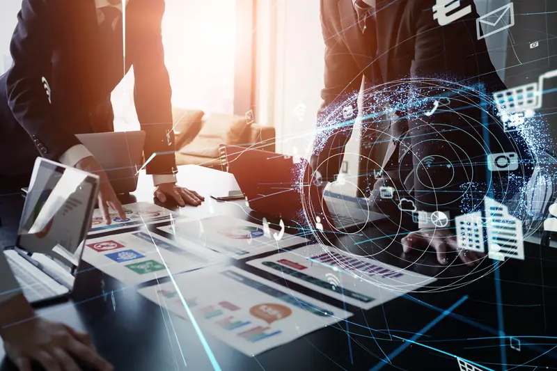 A business meeting with a digital data overlay
