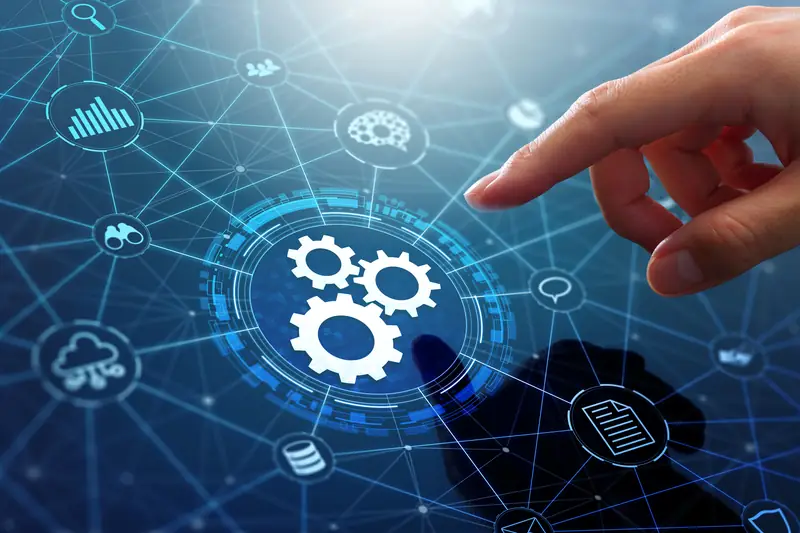 A hand touching a digital interface of gears