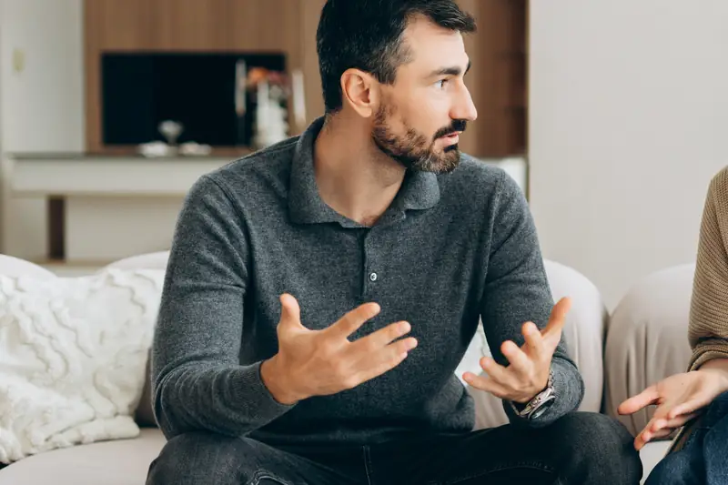 A man explaining his view in a frank conversation