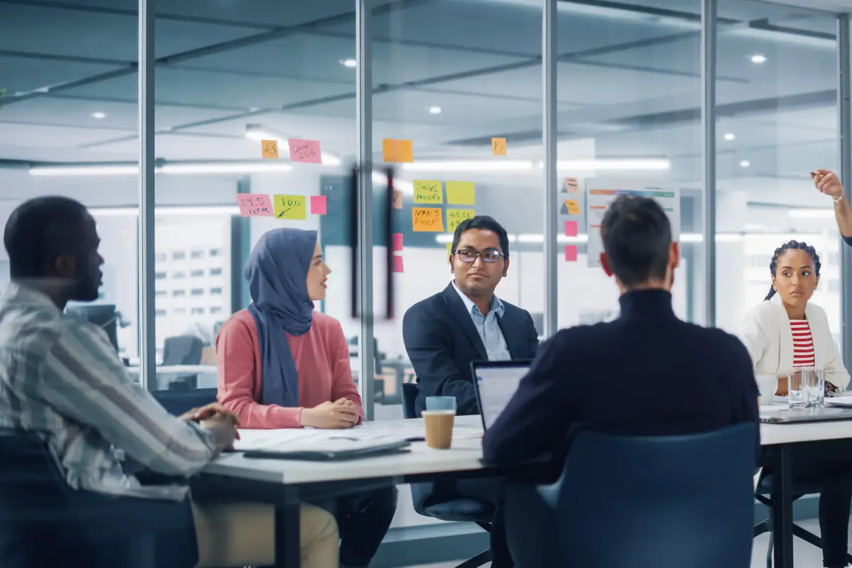A team seated in a modern meeting room