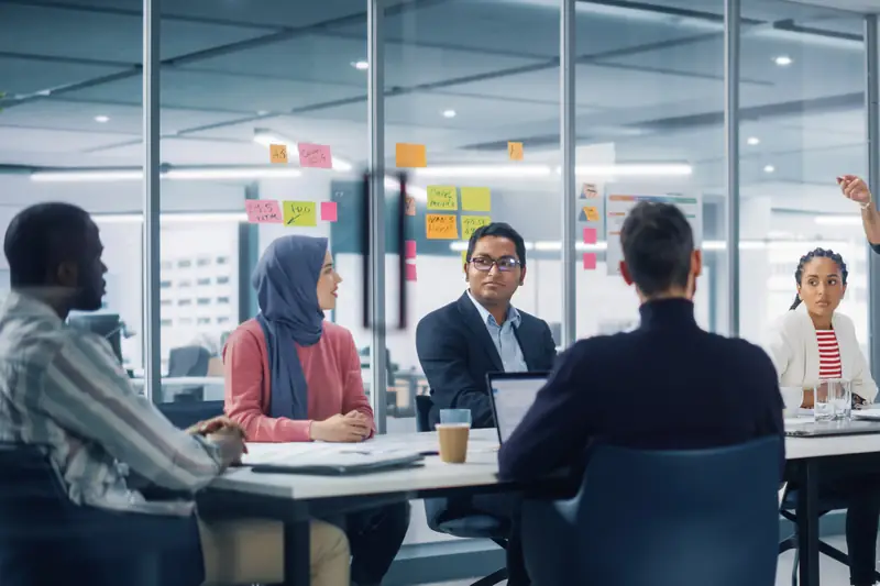 A team seated in a modern meeting room