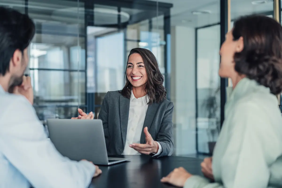 A woman leading a meeting with confidence